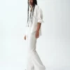 Pantalones acampanados de mezcla de lino de talle bajo