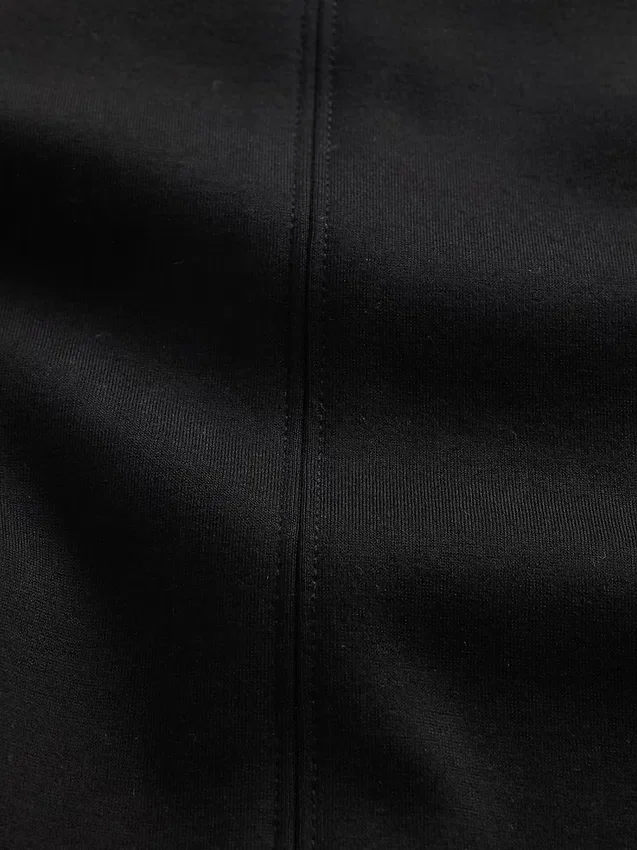 Pantalones acampanados de punto doble de talle bajo