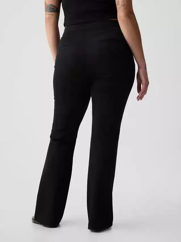 Pantalones acampanados de talle alto con tejido elástico en dos direcciones