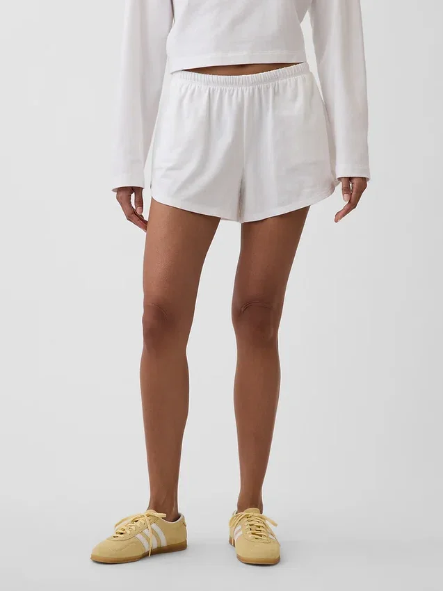 Pantalones cortos de punto con bajo en forma de delfín de 3"