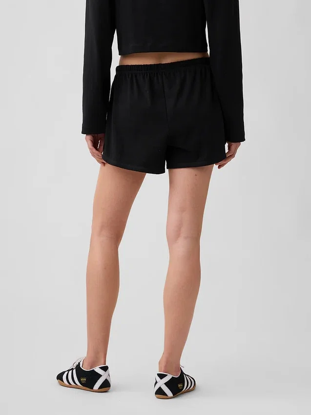 Pantalones cortos de punto con bajo en forma de delfín de 3"