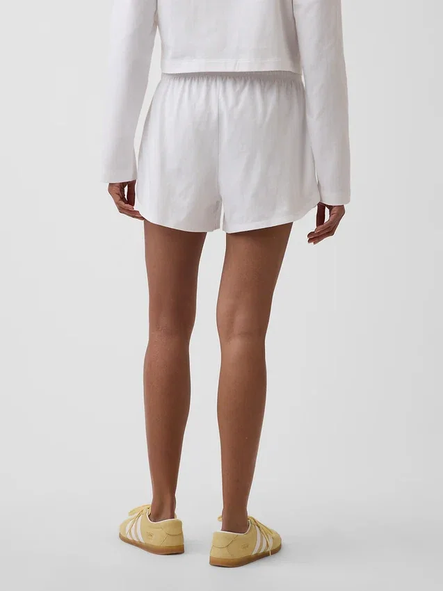 Pantalones cortos de punto con bajo en forma de delfín de 3"