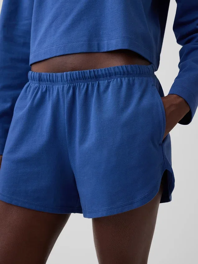 Pantalones cortos de punto con bajo en forma de delfín de 3"