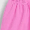 Pantalones cortos de punto con bajo en forma de delfín de 3"