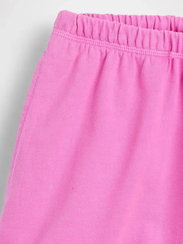 Pantalones cortos de punto con bajo en forma de delfín de 3"