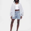 Pantalones cortos de punto vaquero estampado de talle medio