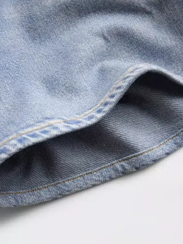 Pantalones cortos de punto vaquero estampado de talle medio