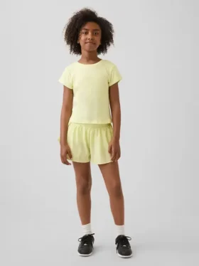 Pantalones cortos de running de secado rápido con bajo de mariposa para niños