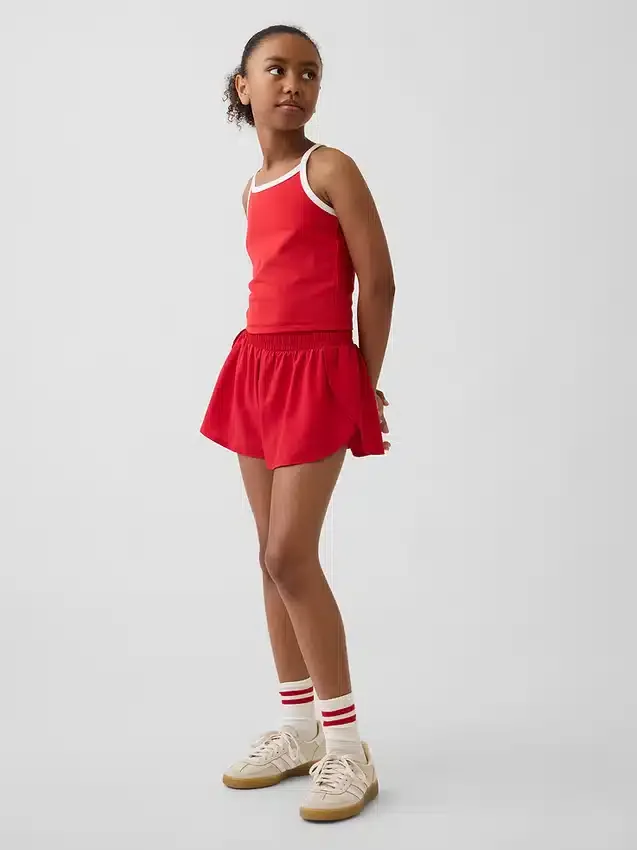 Pantalones cortos de running de secado rápido con bajo de mariposa para niños