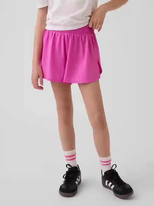 Pantalones cortos de running de secado rápido con bajo de mariposa para niños
