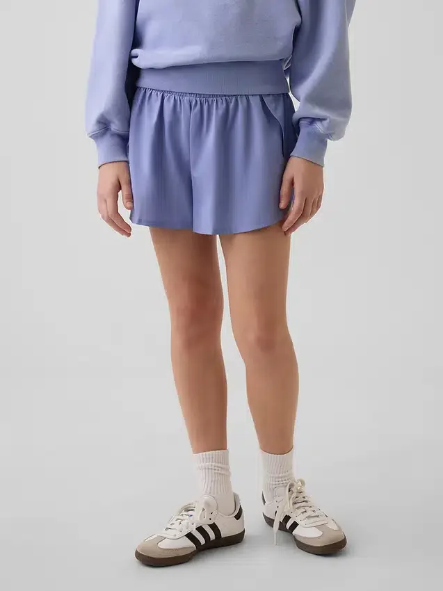 Pantalones cortos de running de secado rápido con bajo de mariposa para niños