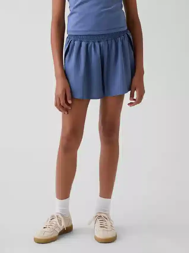 Pantalones cortos de running de secado rápido con bajo de mariposa para niños