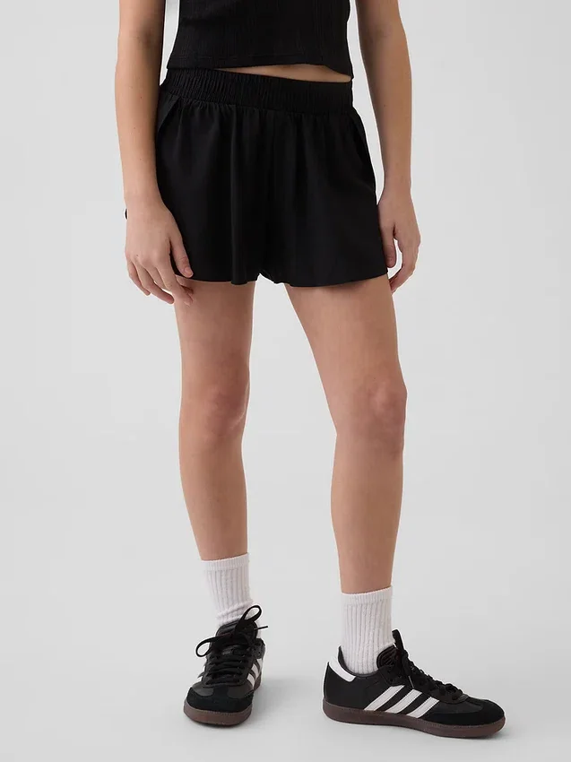 Pantalones cortos de running de secado rápido con bajo de mariposa para niños