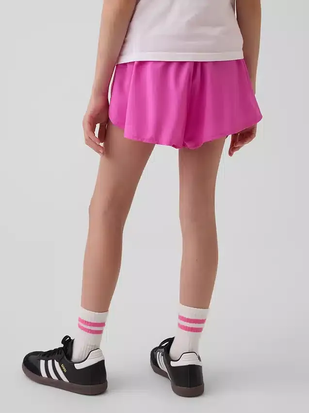 Pantalones cortos de running de secado rápido con bajo de mariposa para niños