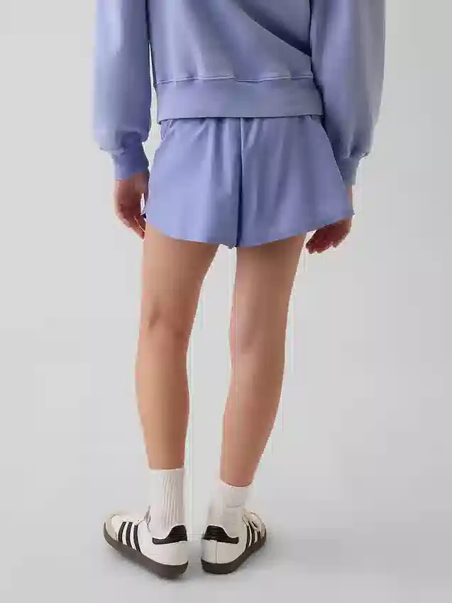 Pantalones cortos de running de secado rápido con bajo de mariposa para niños