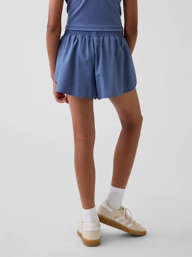 Pantalones cortos de running de secado rápido con bajo de mariposa para niños