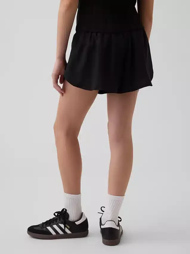 Pantalones cortos de running de secado rápido con bajo de mariposa para niños