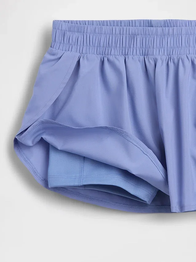 Pantalones cortos de running de secado rápido con bajo de mariposa para niños