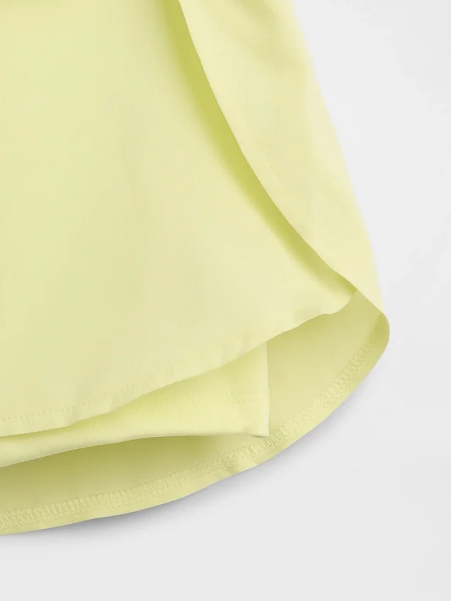 Pantalones cortos de running de secado rápido con bajo de mariposa para niños
