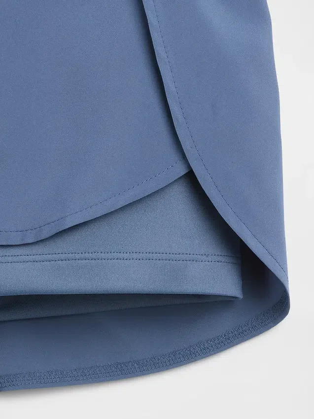 Pantalones cortos de running de secado rápido con bajo de mariposa para niños