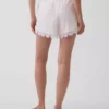 Pantalones cortos de talle medio de 4" con ribete de encaje y mezcla de lino