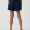 Pantalones cortos infantiles de lino y algodón con ribete de encaje