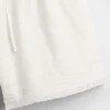 Pantalones cortos infantiles de lino y algodón con ribete de encaje