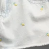 Pantalones cortos vaqueros de cintura baja para niños con bordado de limones
