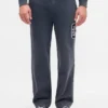 Pantalones de chándal de adulto de tejido grueso y corte holgado con logotipo