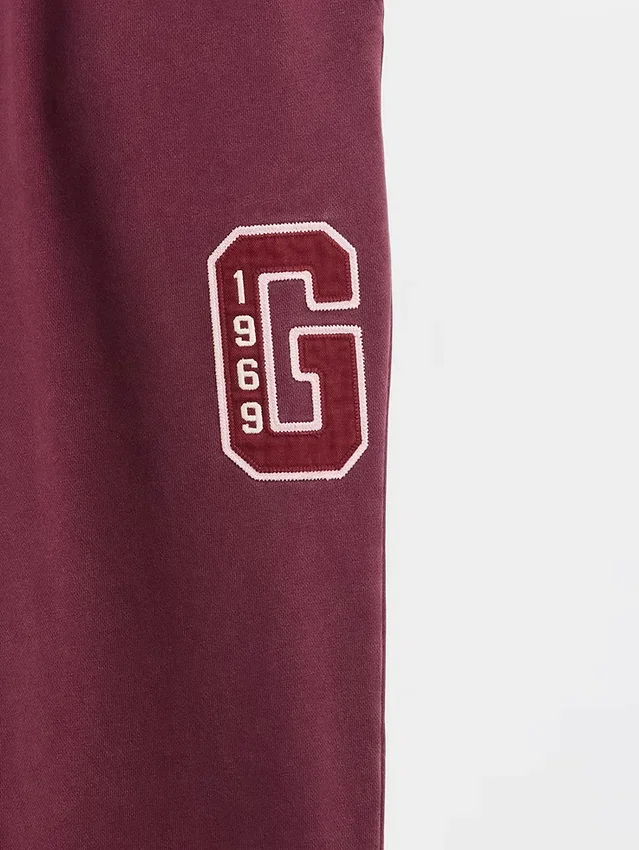 Pantalones de chándal de adulto de tejido grueso y corte holgado con logotipo