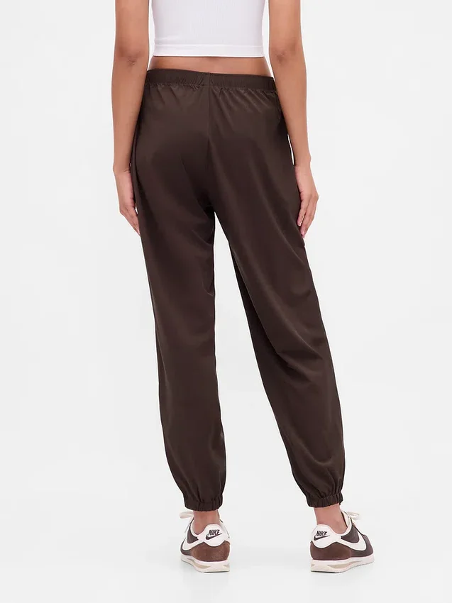 Pantalones de chándal GapFit Tech de talle alto con cremallera en el bajo