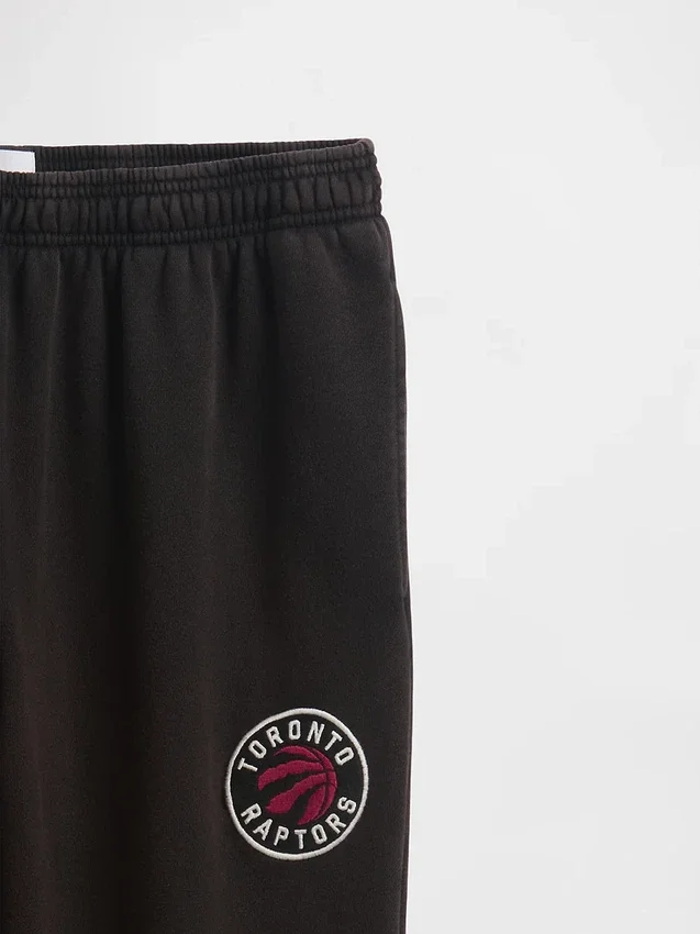 Pantalones de chándal gruesos con el logotipo de los Toronto Raptors de la NBA
