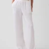 Pantalones de gasa de algodón con bajo con aberturas