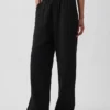 Pantalones de gasa de algodón con bajo con aberturas