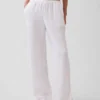 Pantalones de gasa de algodón con bajo con aberturas