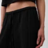 Pantalones de gasa de algodón con bajo con aberturas