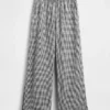 Pantalones de gasa de algodón con bajo con aberturas