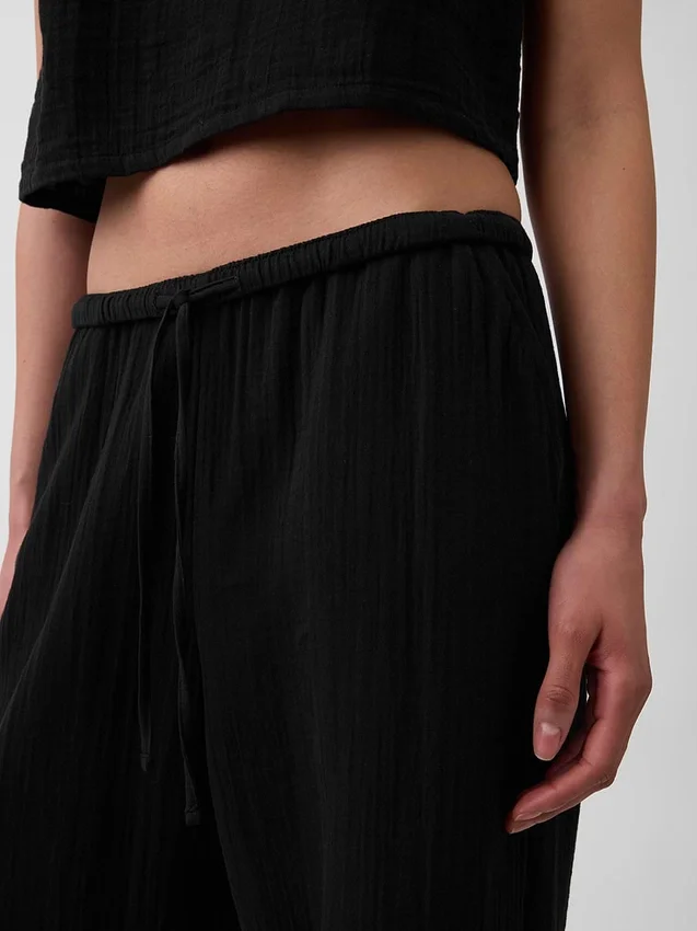 Pantalones de gasa de algodón con bajo con aberturas