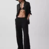 Pantalones de gasa de algodón con bajo con aberturas