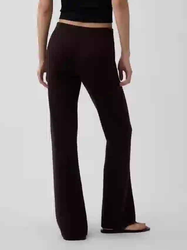 Pantalones de punto de mezcla de algodón de talle bajo con corte acampanado