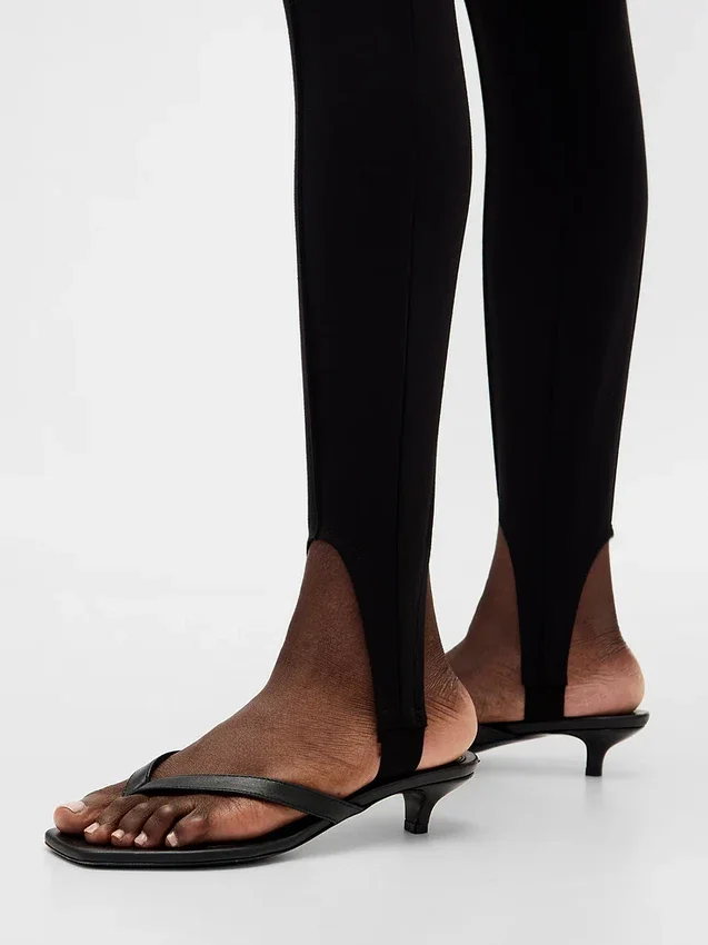Pantalones de talle alto con estribos de punto doble