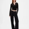 Pantalones de talle bajo con pliegues y pernera ancha 365