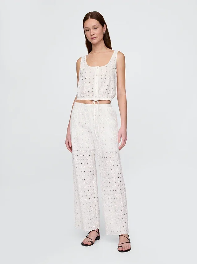 Pantalones de talle medio con ojales y corte ancho