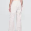 Pantalones de talle medio con ojales y corte ancho