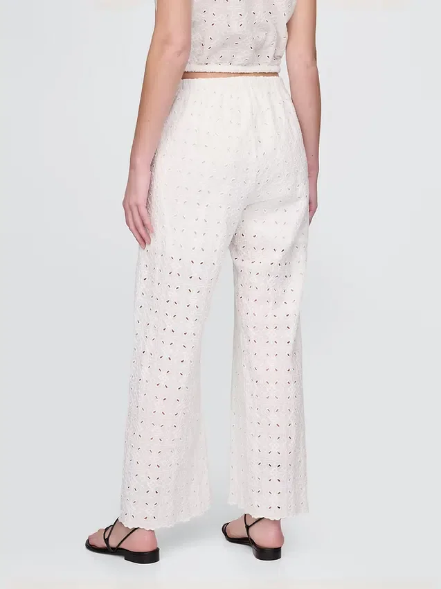 Pantalones de talle medio con ojales y corte ancho
