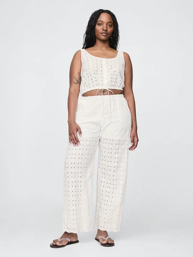 Pantalones de talle medio con ojales y corte ancho