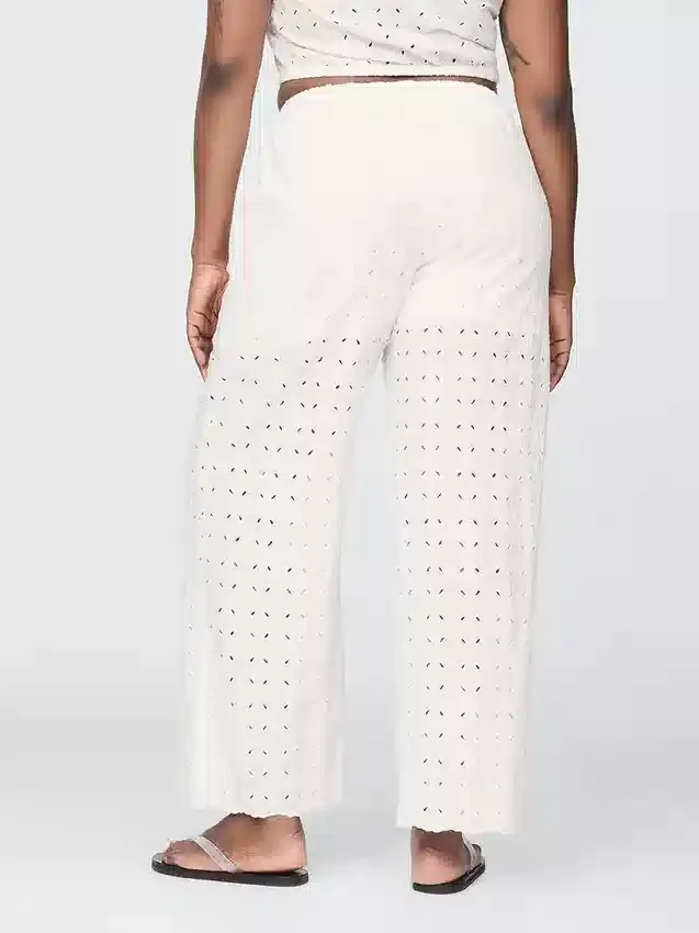 Pantalones de talle medio con ojales y corte ancho