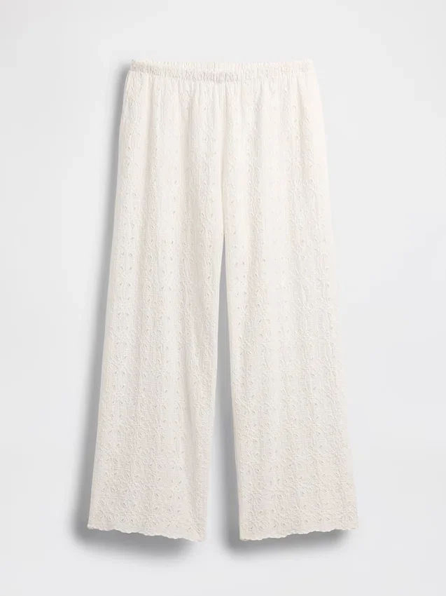 Pantalones de talle medio con ojales y corte ancho