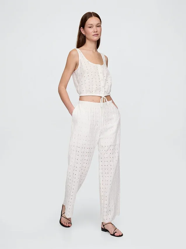 Pantalones de talle medio con ojales y corte ancho