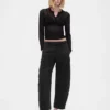 Pantalones de talle medio de sarga con corte acampanado